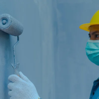 technician-using-paint-roller (1)